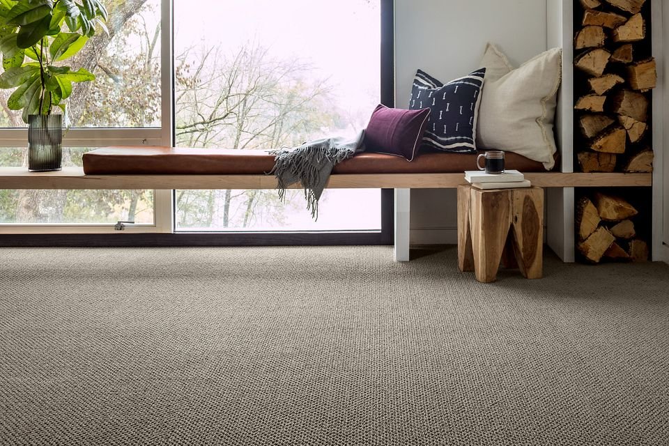 relaxing corner with a big window and gray carpet from Excel Carpet LTD in the Commack, NY area